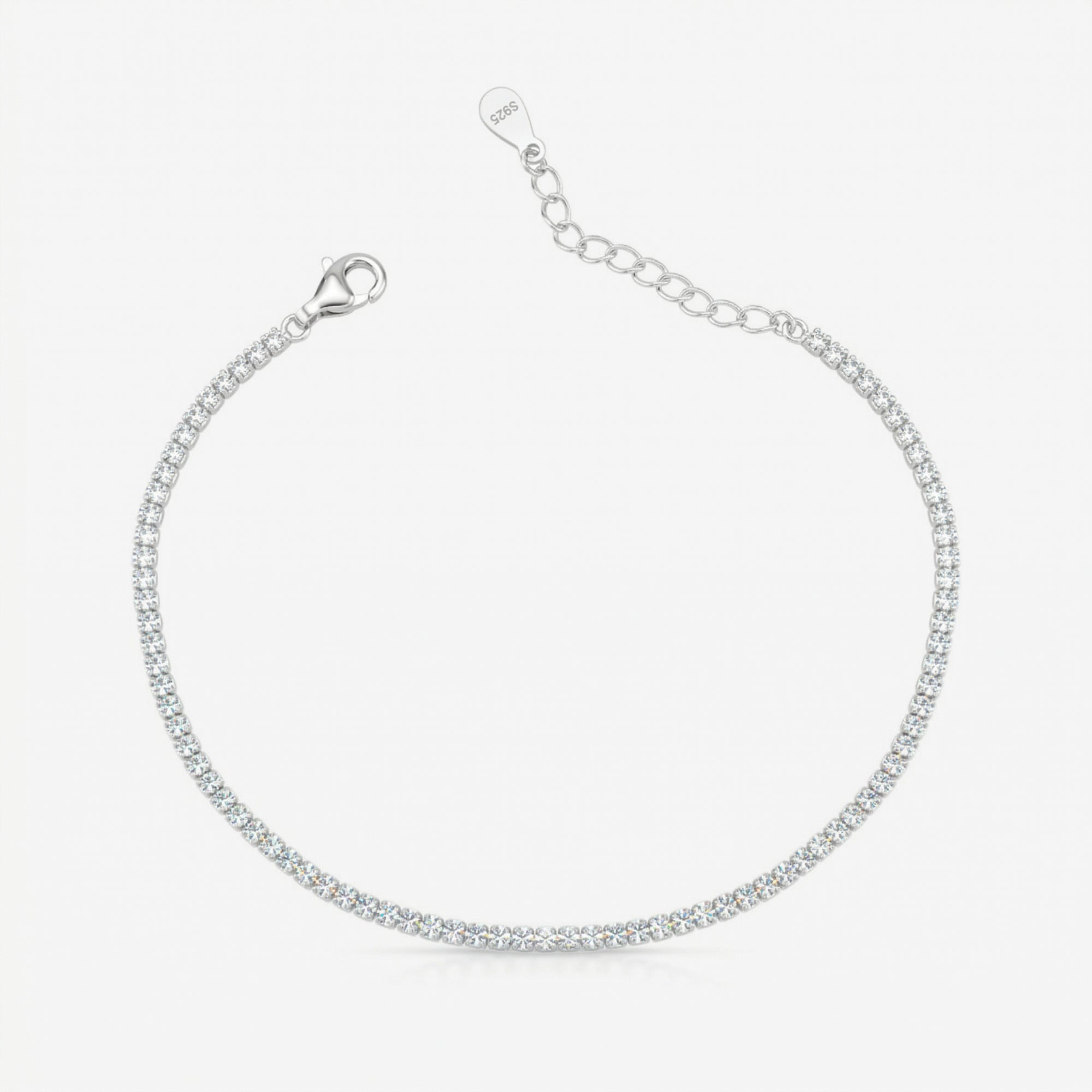 Pulseira Riva em prata 925 com linha contínua de zircônias brancas, fecho boia e extensor regulável, vista superior